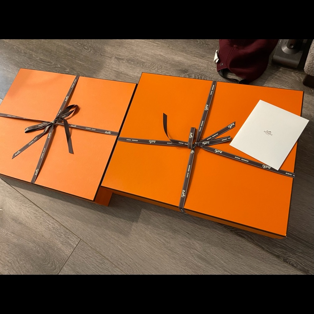 two empty hermes boxes